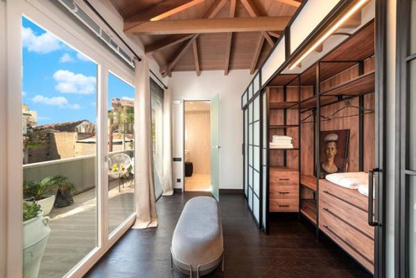 &Sigma;&upsilon;&nu;&epsilon;&rho;&gamma;&alpha;&sigma;ί&alpha; Hilton &kappa;&alpha;&iota; Green Properties &ndash; &Mu;&epsilon;&lambda;ά&kappa;&eta;&sigmaf; A.E. &gamma;&iota;&alpha; &tau;&omicron; &Eacute;RA Hotel Heraklion, Tapestry Collection by Hilton